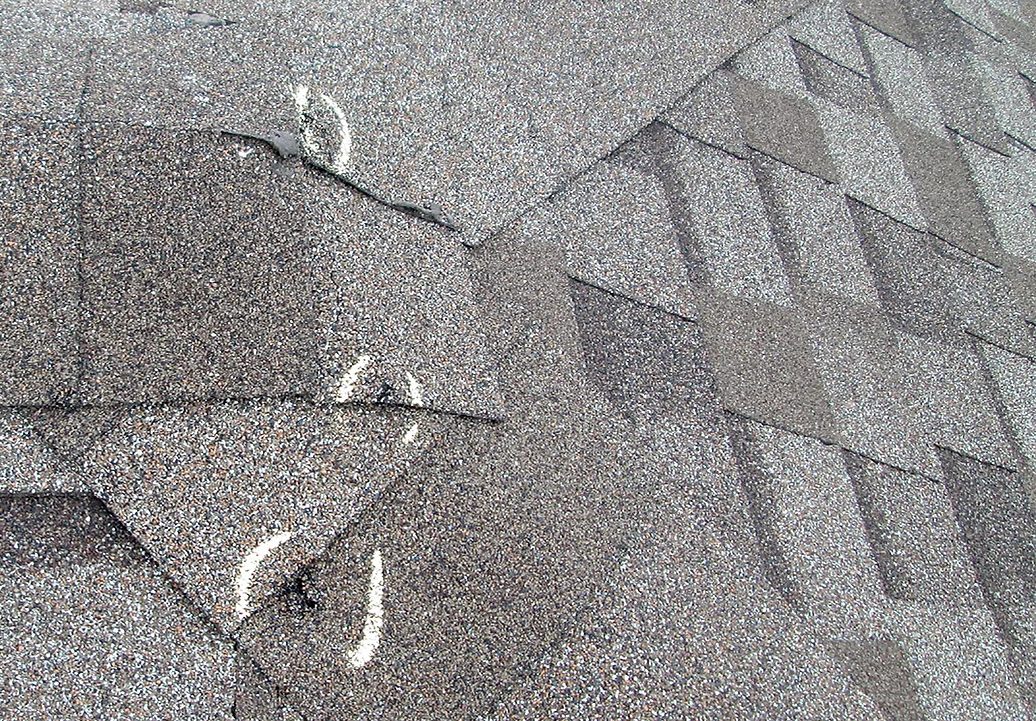 Bruised asphalt shingles - Lake of the Ozarks roofing, John Beal Roofing Lake of the Ozarks