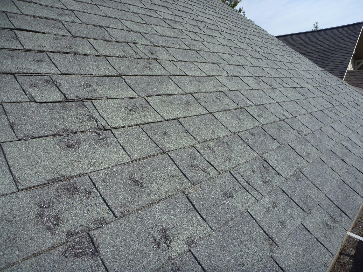 Hail damage roof inspection storm - Lake of the Ozarks roofing, John Beal Roofing Lake of the Ozarks