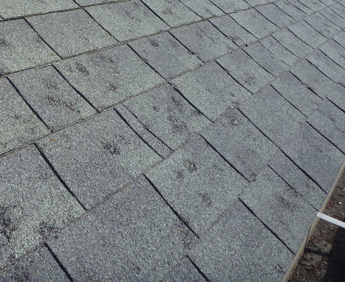 Roof storm strikes lower slope - Conway roofing, John Beal Roofing Lake of the Ozarks